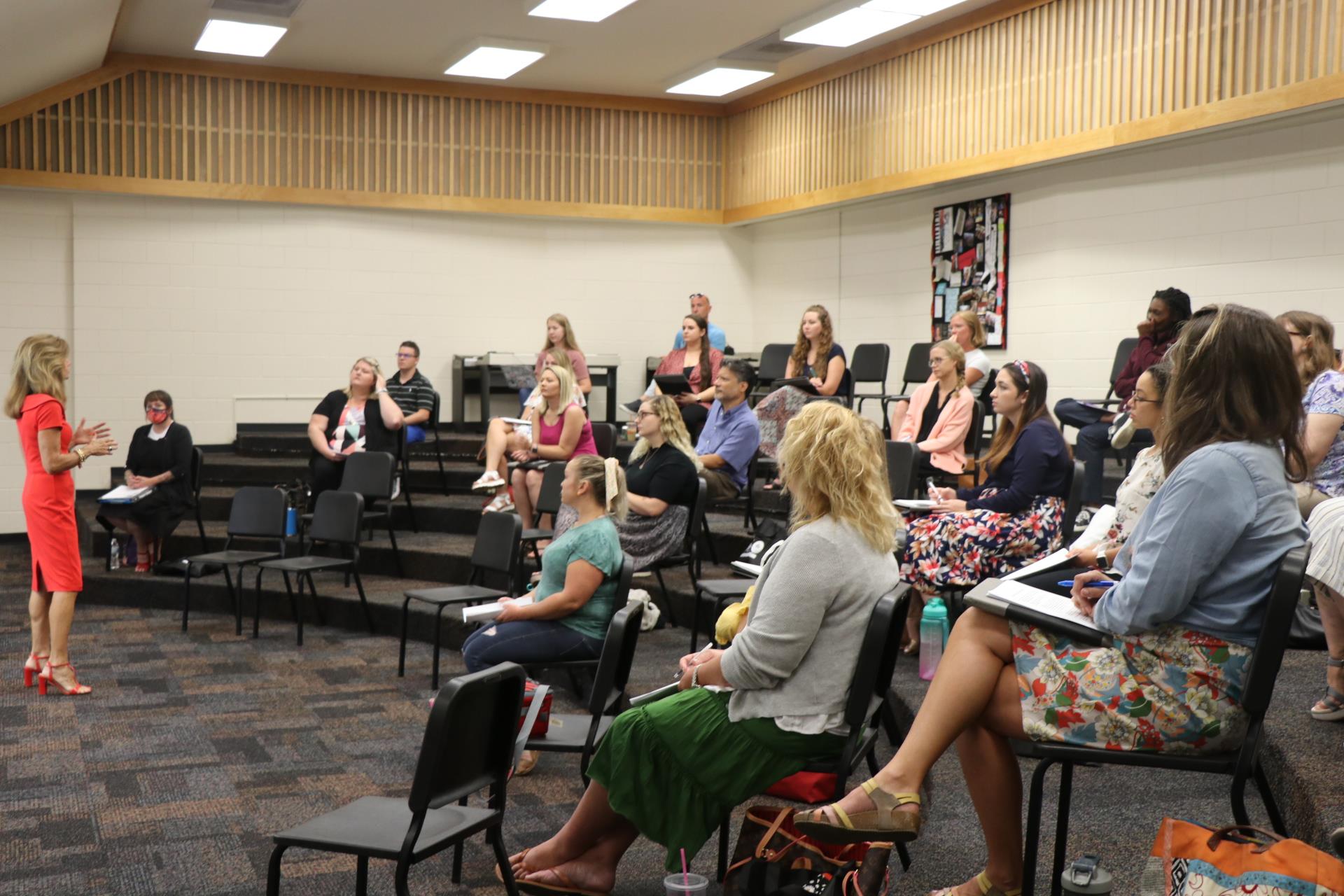 Val Walker from the Office of Professional standards discusses ethics with new teachers.